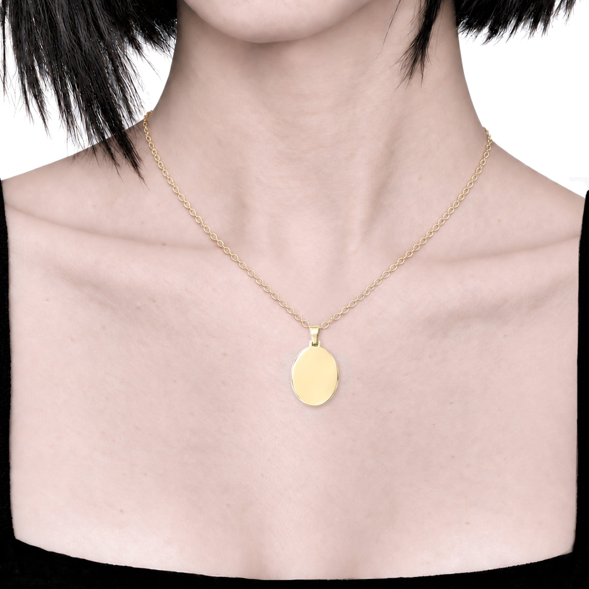 Dije ovalado personalizable revestido en oro