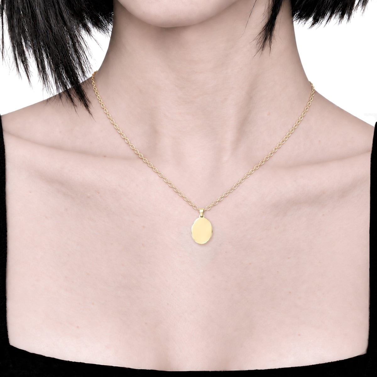 Dije ovalado personalizable revestido en oro