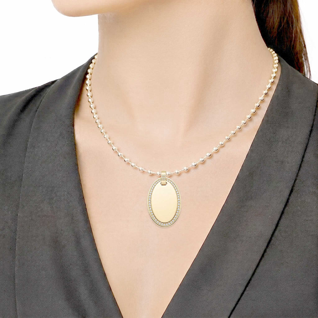 Dije personalizable ovalado con zirconitas revestido en oro